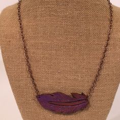 Hand Tooled Leather Feather Necklace. Featuring A Tooled Leather Feather That Was Hand Cut And Carved To Look Like A Feather. Antiques And A Metallic Purple Effect. Back Is Antiqued And Sealed. Chain Is Antiqued Copper Tone. Lightweight Necklace. 21” Long. Feather Is 2.5” Long And 1 1/8” On The Widest Part. Pearl Bib Necklace, Whistle Necklace, Genuine Pearl Necklace, Peacock Pendant, Layered Choker Necklace, Chunky Chain Necklaces, Feather Necklace, Layered Chokers, Back Necklace