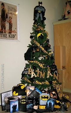 a christmas tree with batman decorations on it