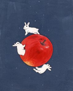 an apple with rabbits on it in the middle of two other white rabbits running around