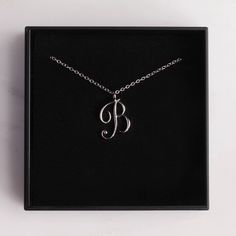 Letter B Initial Necklace - Cursive "B" initial silver pendant - Personalized initial silver pendant for women / Gift for her / for mom Dainty "B" initial. Perfect every day necklace. Lovely gift for your self, sister, bridesmaids, new mom. Pendant: Base metal is brass and silver plated on top. Chain is 18 inches, sterling silver. Note: model shots might show a different initial, only to illustrate overall look and length of the chain. This listing is for the "B" initial. B Cursive, B Initial Necklace, Cursive B, Every Day Necklace, Personalized Initial Ring, B Initial, Mom Pendant, Initial Necklace Silver, Initial Pendant Necklace