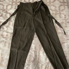 New Never Worn Pants In Woven Fabric. High Waist With Pleats, Removable Tie Belt, And Zip Fly With Concealed Hook-And-Eye Fastener. Side Pockets With Tapered Legs With Creases. True To Size. Khaki Belted Bottoms For Work, Khaki Belted Workwear Bottoms, High Waist Belted Khaki Bottoms, High Waist Khaki Belted Bottoms, Khaki High-waist Belted Bottoms, High Waist Khaki Bottoms For Office, High-waist Belted Khaki Bottoms, High-waist Khaki Bottoms For Office, H&m High Waist Bottoms With Pockets