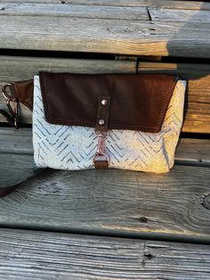 A versatile and gorgeous bag for you to wear!  Can be worn around the waist, across the body in front or across the body in the back.  Front flap is a beautiful soft dark brown leather with leather tabs for the hardware; which hardware is in rose gold.  The exterior of this sling bag is in a boho medallion in cream and black dogwood denim and the interior of the bag is in heavy waterproof black canvas. An exterior zippered pocket will hold a large size phone and more and an interior zippered poc Bag Belt, Gorgeous Bags, Dark Brown Leather, Black Canvas, Sling Bag, Belt Bag, Cross Body Handbags, Purses And Handbags, Or Rose