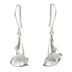 Calla lilies are believed to symbolize magnificent beauty and so inspire the design of these earrings by Regina Flores Montes. The luminous silver earrings are crafted by hand with extraordinary detail. .950 Silver Silver Petal-shaped Earrings For Gift, Delicate Silver Petal Earrings, Elegant Flower Shaped Earrings With French Hook, Elegant Floral Earrings With French Hook, Elegant Flower Earrings With French Hook, Silver Dangle Flower Earrings For Formal Occasions, Elegant Flower-shaped Earrings With French Hook, Elegant Hypoallergenic Silver Flower Earrings, Calla Flower