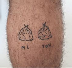 a close up of a person's legs with tattoos on them that say me you