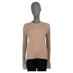 100% authentic Céline by Phoebe Philo sweater in rib-knit wool (77%) and polyamide (23%). Features long sleeves with bell cuffs in jersey and a slightly longer back. Has been worn and is in excellent condition. 2015 Fall/Winter Measurements Model 23DA27261 Tag Size M Size M Shoulder Width 40cm (15.6in) Bust 70cm (27.3in) to 100cm (39in) Waist 64cm (25in) to 90cm (35.1in) Hips 60cm (23.4in) to 90cm (35.1in) Length 66cm (25.7in) Side Seam Length 45cm (17.6in) Sleeve Length 69cm (26.9in) All our listings include only the listed item unless otherwise specified in the description above Lace Peplum Blouse, Vest Blouse, Phoebe Philo, Bow Blouse, Ribbed Knit Sweater, Leather Vest, Knitted Tshirt, Knitted Pullover, Bell Sleeve