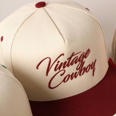 Vintage Cowboy Embroidery Two-Tone Baseball Cap - "Vintage Cowboy" Text Embroidery - 5 Panel Canvas Baseball Cap - 100% Cotton - Adjustable Buckle Closure - Embroidered In USA *One Size Fits All - Adjustable Strap Makes Fit Comfortable.* The VANTAGE Two-Tone Embroidery Trucker Hat blends style and functionality with its distinctive design. The hat features a two-tone color scheme, combining a vibrant or contrasting color on the front panels with a complementary. The embroidered detailing on the Retro Flat Bill Hat With Embroidered Logo, Retro Snapback Hat With Embroidered Logo And Curved Brim, Retro Snapback Baseball Cap With Embroidered Logo, Retro Snapback Hat With Embroidered Logo, Retro Embroidered Logo Snapback Baseball Cap, Retro Adjustable Fitted Hat With Embroidered Logo, Retro Trucker Hat With Embroidered Logo, Retro Adjustable Snapback Hat With Embroidered Logo, Retro Fitted Hat With Embroidered Logo