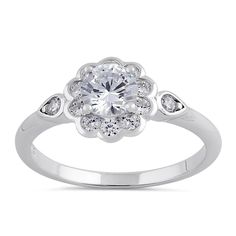 Top of Ring Height: 9.0mm

Top of Ring Width: 9.0mm

Band Width: 1.9mm

Shank Width: 1.6mm



Stone material: Clear Cubic Zirconia

Center stone size: 5.5mm

Stone shape: Round

Center stone carat weight: 0.66 ct.

Total number of CZ stones: 13

Stone setting: Prong



Metal: 925 Sterling Silver

Plating: Rhodium Plated

Finish: High Polish Flower Shaped Rings With Accent Stones For Anniversary, Flower-shaped Rings With Accent Stones For Anniversary, Flower-shaped Anniversary Rings With Accent Stones, Cubic Zirconia Flower Promise Ring, Diamond White Flower Ring With Halo Setting, Elegant Flower-shaped Cubic Zirconia Rings, Elegant Flower Shaped Crystal Ring, Elegant Flower-shaped Promise Ring, Cubic Zirconia Flower Ring With Center Stone For Promise