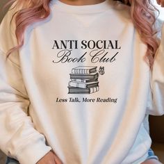 Cozy Reading Crewneck Sweatshirt, Anti Social Book Club Design, Less Talking More Reading, Reading Apparel, Gift for Book Lovers, Introvert Cozy reading apparel for the anti-social book club members. This crewneck sweatshirt is perfect for those who prefer less talking and more reading. It provides a comfy and warm wearing experience, ideal for colder months. Relevant for book lovers and introverts who enjoy a cozy night in with a good book. Great for holidays like Christmas and cozy winter nights. Product features Available in a range of sizes (S, M, L, XL, 2X, 3X) - Knit in one piece using tubular knit for reduced fabric waste - Ribbed knit collar with seam for shape retention - Made with 50% cotton and 50% polyester for cozy feel - Double-needle stitching for durability 🛍️Click here to Cozy Night, Club Design, Anti Social, Cozy Winter, Book Lovers Gifts, Book Club, Good Books, Crewneck Sweatshirt