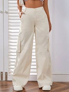 Elevate your casual style with these High Waist Patched Pocket Wide Leg Pants. Crafted from non-stretch fabric, they offer a loose and comfortable fit. The cargo pant design adds a touch of utility, while the high waist provides a flattering silhouette. With a variety of sizes available, find the perfect fit for you. Detail: Style: Casual Pattern Type: Plain Type: Cargo Pants Length: Long Fit Type: Loose Fabric: Non-Stretch Material: Fabric Composition: 100% Polyester Care Instructions: Machine White Utility Cargo Pants For Fall, Casual Cargo Jeans With Elastic Waistband For Workwear, Non-stretch Cotton Wide Leg Cargo Pants, Non-stretch Cotton Utility Pants, Wide-leg Cargo Pants With Elastic Waistband, Baggy Cargo Jeans With Elastic Waistband, White High-waisted Cargo Pants For Fall, Chic Cotton Parachute Pants With Pockets, Chic Baggy Cargo Pants With Pockets