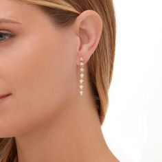 Infinite balance meets fluid movement. The Round Bezel Tennis Earrings is a series of classic round bezels featuring the MM signature bezel with a wider frame of gold surrounding the diamond for a more visually impactful style. Everyday luxe for day and night. SKU #ER414 12pcs 2.2mm G/H SI2 round diamonds 0.63ctw 55mm long double notched posts for added security 6mm earring backs Tennis Earrings, Fluid Movement, Tennis Necklace, Day And Night, Earring Backs, Jewelry Bags, Round Diamonds, Ear Cuff, Diamond Earrings