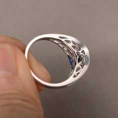 This is a gorgeous handmade creation. Its beauty is its simplicity & Elegance. The 7*7mm round shape faceted lab sapphire is crafted in solid sterling silver and with rhodium plated. All item is sent in a beautiful gift box If you have any idea of design your ring,pls contact me directly. You can realize more lovely stuff clicking the link https://www.etsy.com/shop/knightjewelry?refshopsection_shophome_leftnav Please leave the correct address and you phone number for delivering successfully. Diamond White Sapphire Rings With Gemstones, Sapphire Crystal Ring With Prong Setting, Sapphire Promise Ring With Bezel Setting And Round Stone, Lab-created Sapphire Round Cut Promise Ring, Gift Diamond White Lab-created Sapphire Ring, Anniversary White Gold Sapphire Crystal Ring, Elegant Round Sapphire Ring, Diamond Birthstone Crystal Ring, Cubic Zirconia Sapphire Ring Gift