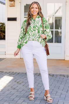 Elevate your style with this amazing top in a pretty green color! The vibrant floral pattern adds a touch of femininity, perfect for a day out on the town! Pair it with white denim and heels for a chic and classy look! 100% Polyester Spring Green Tops With Floral Print, Green Floral Print Tops For Day Out, Chic Green Tops For Day Out, Green Cotton Blouse For Spring, Green Spring Tops For Work, Spring Green Tops For Work, Spring Green Tops For Workwear, Green Blouse For Spring Day Out, Green Floral Print Blouse For Spring