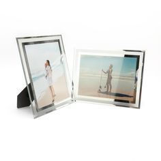 an open photo frame with two people on the beach