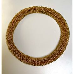 This is part of Chairish’s Costume Jewelry assortment.  Spectacular Vintage CINER Jewelry Yellow 18k Gold Plated Metal Caviar or Bubble Designs Beaded Collar Necklace from the early 1980s.  17" by 1.5" thick Gold Hallmarked Necklaces For Evening, Luxury Yellow Gold Choker, Yellow Gold Choker Necklace For Evening, Luxury Yellow Gold Choker For Formal Events, Luxury Gold Beaded Formal Necklaces, Luxury Gold Beaded Necklaces For Formal Occasions, Formal Gold Flexible Necklace, Luxury Formal Gold Beaded Necklaces, Luxury Gold Choker For Formal Occasions