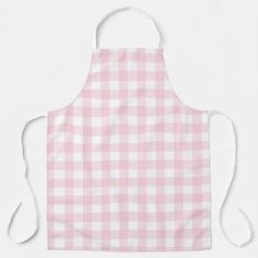 a pink and white gingham checkered apron