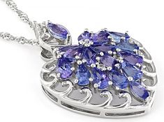 2.88ctw Marquise and Pear Shape Tanzanite with 0.12ctw Round White Zircon Rhodium Over Sterling Silver Pendant with Chain. Measures Approximately 1.31"L x 0.88"W. 18" Singapore Chain with 2" Extender. Lobster Claw Clasp. Accent Stones Primarily Zircon. Fine Jewelry With Cluster Gemstone Accents, Fine Jewelry With Gemstone Cluster Accents, Cluster Jewelry With Accent Stones For Gifts, Sterling Silver Cluster Jewelry With Accent Stones, Silver Cluster Gemstone Jewelry, Sterling Silver Cluster Gemstone Jewelry, Cluster Multi-stone Jewelry For Gifts, Pear-shaped Multi-stone White Gold Jewelry, Silver Pear-shaped Gemstone Jewelry