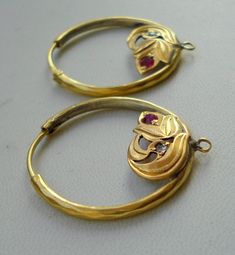 VINTAGE ANTIQUE ETHNIC 18k GOLD EARRING PAIR HOOP FROM RAJASTHAN INDIA, GREAT HANDMADE DESIGN, MADE OF 18 CARAT YELLOW GOLD ADORN WITH GLASS STONES, GOOD FOR JEWELLERY COLLECTION.Diameter - 2.5 cm(0.98") Weight - 7.600 gramsMaterial - 18k solid yellow gold & original old worn piece. 18k Gold Earrings, Ancient Jewelry, Earrings Hoop, Rajasthan India, Snow Jacket, Gold Earring, Jewelry Earrings Hoops, Jewellery Collection, Handmade Design