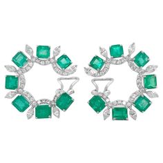 These stunning earrings are a masterpiece of elegance, combining 18kt white gold with top-quality emeralds and dazzling diamonds. They exude timeless luxury and sophistication, perfect for any special occasion. 18kt White Gold Earrings with Emeralds 6.47 carats and Diamonds 1,94 carats. Perfect gift for Christmas, Mom, Girlfriend, Daughter, Graduation, Birthday and more. Earrings 2024, Daughter Graduation, Jeweled Earrings, Timeless Luxury, White Gold Earrings, Christmas Mom, Emerald Jewelry, Gift For Christmas, Stunning Earrings