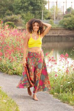 Cool, breezy upcycled sari skirtwith a seventies vibe. Made of beautiful light fabric that's great for summertime lounging. It flows and floats as you walk, a very elegant and feminine skirt.  SIZE  ONE SIZE:  Waistband = 28-36" (71-91.5 cm) Length = 36" (91.5 cm) THIS LISTING IS FOR BOLD FLOWERS Also available in other colours, please check our listings. Code: DRAGONFLY SKIRT (SDDFLY) Hippie Style Wrap Skirt For Beach In Spring, Hippie Style Spring Beach Wrap Skirt, Hippie Spring Beach Wrap Skirt, Summer Hippie Relaxed Skirt, Hippie Style Relaxed Skirt For Summer, Relaxed Hippie Skirt For Summer, Bohemian Wide Leg Beach Skirt, Hippie Summer Lined Maxi Skirt, Hippie Beach Maxi Skirt