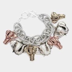 Wear this Osuno Elephant Charm Bracelet with any outfit any season and standout from the crowd. Color: Antique Gold, Antique silve, hermatite, etc• Size : 2" H, 8.5" L• Toggle Closure• Lead and Nickel Compliant Metal Elephant, Elephant Charm Bracelet, Arm Bracelets, Elephant Bracelet, Bridal Gloves, Head Chain, Wrist Wear, Wedding Belts, Elephant Charm