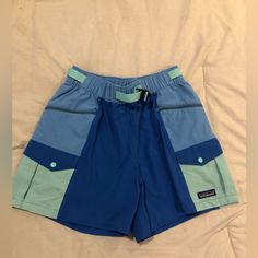 Patagonia Outdoor Everyday Shorts 4” Blue New Patagonia Bottoms With Built-in Shorts For Outdoor Activities, Patagonia Sporty Hiking Shorts, Blue Bottoms With Built-in Shorts For Outdoor Activities, Patagonia Blue Shorts, Patagonia Blue Short Bottoms, Blue Bottoms With Built-in Shorts For Outdoor, Casual Swim Trunks With Pockets For Outdoor, Blue Swim Trunks With Side Pockets, Patagonia Cotton Shorts With Pockets