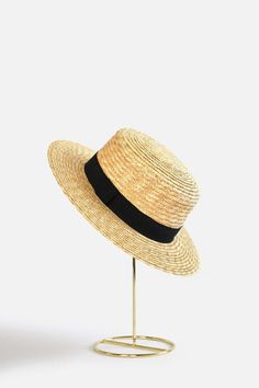 Bring classically chic flair to your summer look with the Abella Classic French Boater Hat. This classic French accessory is made from breathable straw and designed with an adjustable pull string for the perfect fit. You'll love the elegant aesthetic this piece adds to any ensemble.Head circumference: 55.5cm (designed with adjustable pull string for the perfect fit)Your purchase can also be made at:www.enbelleepoque.com Chic Spring Boater Hat Made Of Paper Straw, Adjustable Black Straw Hat Made Of Paper Straw, Summer Curved Brim Boater Hat For Picnic, Summer Picnic Boater Hat With Curved Brim, Summer Boater Hat For Kentucky Derby Picnic, Adjustable Summer Hats For Picnic, Summer Boater Hat For Picnics, Spring Summer Boater Hat For Picnic, Summer Boater Hat For Spring Picnic