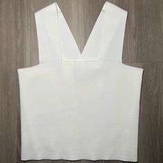 Nwot White Crop Top From Zara In Great Condition. Can Fit A Xs Or Small. This Top Showcases A Perfect Balance Of Elegance And Modernity. A Chic And Versatile Addition To Your Wardrobe That Exudes Sophistication And Style. Crafted With Meticulous Attention To Detail, This Elegant Piece Is Designed To Elevate Your Fashion Game And Leave A Lasting Impression Chic White Tank Top By Zara, Chic White Zara Tank Top, Zara White V-neck Crop Top, Elegant Zara V-neck Crop Top, Elegant V-neck Crop Top By Zara, Zara V-neck Tank Top For Day Out, Zara Crop Top, Zara White, White Crop