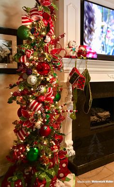 a christmas tree decorated with red, green and white ornaments