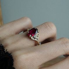 Read about our payment plans before proceeding. Our exquisite Alhambra Glow Rubellite Cushion Ring, a testament to luxury and cultural inspiration. Crafted with precision, this ring boasts a one of a kind premium, eye-clean natural rubellite centerpiece. Surrounding the captivating rubellite are six meticulously set diamonds, adorned with Islamic design characteristics reminiscent of the ornate beauty found in the architecture of Old Cairo in Egypt. Immerse yourself in the rich history and opule Red Diamond Ring Engagement, Magical Fashion, Ruby Engagement Ring Vintage, Old Cairo, Ring Inspo, Fall Rings, Engagement Rings Cushion, Rubellite Tourmaline, Cushion Ring