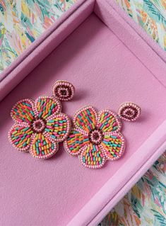 Add a pop of color to your summer wardrobe with our Flower Power Earrings. These beaded earrings exude a vibrant energy, perfect for a fun and lively look. Elevate any outfit with these must-have accessories. Measures : 3" Artisan Earrings, Vibrant Energy, Pop Of Color, Summer Wardrobe, Beaded Earrings, Flower Power, 9 And 10, Color Pop, Best Gifts