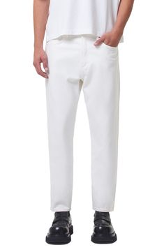 Relaxed but not baggy, these tapered jeans are made from nicely draped nonstretch denim in a bright-white wash that looks good any time of year. 30 1/2" inseam; 14" leg opening; 12" front rise; 14" back rise (size 29) Zip fly with button closure Five-pocket style 100% organic cotton Machine wash, tumble dry Made in Turkey Classic White Tapered Leg Jeans, Casual White Tapered Pants, White Relaxed Fit Cropped Jeans, White Cropped Jeans With Five Pockets, White Tapered Cotton Bottoms, White Tapered Cotton Pants, Modern White Denim Pants, Casual White Tapered Bottoms, White Tapered Leg Jeans