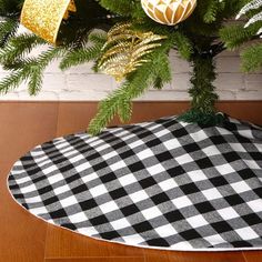 a black and white checkered christmas tree skirt