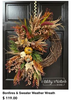 the front door is decorated with an autumn wreath