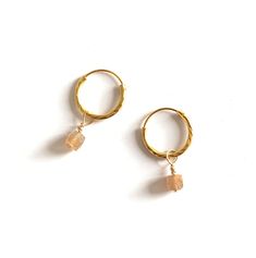 Lovely tiny Diamond Cut vermeil hoops with a gemstone charm, Sunstone is a beautiful stone with tones of gold and orange. These dainty and elegant hoops combine perfect with any outfit from casual to chic. SUNSTONE symbolizes positivity, happiness and freedom M A T E R I A L * Charm made of square facetted Sunstone beads ( 3.5 mm) * Vermeil hoops ( 12 mm) diamond cut , gold plated solid sterling 925 silver, * Gift wrap & card with meaning of the stone S I Z E * Hoops 12 mm, total lenght appr Small Gold Earrings, Chrysocolla Jewelry, Gold And Orange, Silver Gift Wrap, Hoops Earrings, Small Letters, Tiny Diamond, Boho Gifts, Seed Bead Bracelets