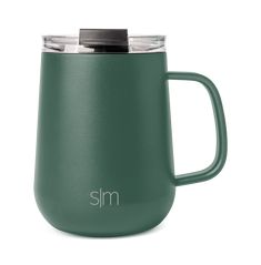 a green mug with the word slim on it