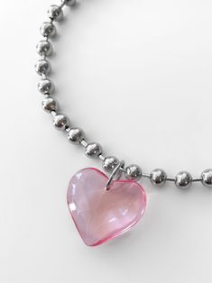 Let this piece do all the talking for you! Meet the limited edition 'LIA' necklace - from a stunning glass heart pendant to stainless steel ball chain, this piece will easily add the perfect touch to any outfit. Trust us, compliments are waiting! ♥ Made with a large pink glass heart pendant and stainless steel ball chain ♥ Waterproof & rust-free ♥ This is a limited edition drop! When these babies sell out, it's forever Available in lengths 14", 15", 16", 18", 20". Model is wearing 14". Handmade Valentine's Day Gift Ball Chain Necklace, Silver Heart Jewelry With Ball Chain, Heart Shaped Ball Chain Necklace For Gift, Silver Heart-shaped Ball Chain Jewelry, Heart-shaped Ball Chain Necklace Gift, Heart Shaped Ball Chain Necklace For Valentine's Day, Heart-shaped Ball Chain Necklace For Valentine's Day, Trendy Ball Chain Necklace For Gift, Trendy Ball Chain Necklace As Gift