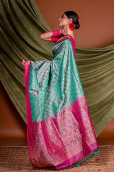 This is pure silk handloom tanchoi banarasi with pink  border pallu. The green color body and pink border and pallu adds extra royalness in it. Green Raw Silk Traditional Wear With Meenakari, Green Traditional Wear With Meenakari In Raw Silk, Green Meenakari Raw Silk Traditional Wear, Green Meenakari Tussar Silk Saree, Green Tussar Silk Saree With Meenakari, Pink Katan Silk Traditional Wear With Meenakari, Green Banarasi Silk Saree With Meenakari, Green Banarasi Silk Handloom Dupatta, Green Banarasi Silk Traditional Wear With Zari Weaving