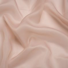 This Blush Satin-Faced Polyester Organza is so romantic that you'll be blushing all night! Featuring a crisp drape, smooth hand, and lustrous face, it's ideal for ethereal evening wear.Suggested Projects:  Dresses, Skirts, Evening WearContent:  100% PolyesterStretch:  NoneOpacity:  SheerThe dusty pink satin face elevates the elegance that is tied to organza—a lightweight fabric lauded for bringing gorgeous volume to eveningwear. The crisp drape, smooth hand, and lustrous face work together to cr Pink Satin Fabric, Mood Designer Fabrics, Blush Pink Color, Mood Fabrics, Dress Forms, Stunning Gowns, Organza Fabric, Peachy Pink, Blush Color