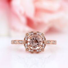 Checkout our New Arrival http://etsy.me/1NHhwAl The center stone is natural 7mm Round Fancy Color AAA Pink morganite. The side stones are Natural diamond in G-H/SI Color/Clarity. The setting is a solid 14k Rose gold and authenticated with a 14k stamp. It has a dazzling high polished finish to make its shininess last longer . You can make it a complete set with a matching band. This ring is absolutely stunning and I am confident you will love it. Perfect for Weddings, Mothers Day, Birthdays, Vale Elegant Morganite Wedding Jewelry With Center Stone, Blush Morganite Ring With Center Stone, Classic Rose Gold Morganite Wedding Ring, Rose Gold Morganite Jewelry With Center Stone, Morganite Rose Gold Jewelry With Center Stone, Morganite Center Stone Rose Gold Jewelry, Blush Morganite Jewelry With Center Stone, Blush Morganite Center Stone Jewelry, Fine Jewelry Blush Color With Center Stone