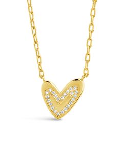 Show your love with this Mabel CZ Heart Pendant Necklace! It's the perfect gift for adding a dazzling touch of sparkle to any special occasion. Crafted with a real cubic zirconia gemstone and shaped into an adorable heart, this dazzling piece will make your special someone feel truly treasured. ❤️ Materials: 14K gold plated sterling silver or sterling silver, cubic zirconia Features: Measures 16" with 2" extender, 0.45" pendant, 1mm chain, Lead & Nickel free, lobster clasp Diamond Necklace For Valentine's Day Gift, Double Heart Diamond Necklace For Valentine's Day Gift, Heart-shaped Yellow Gold Cubic Zirconia Diamond Necklace, Heart-shaped Yellow Gold Cubic Zirconia Necklace, Yellow Gold Heart-shaped Cubic Zirconia Diamond Necklace, Heart-shaped Cubic Zirconia Diamond Necklace In Yellow Gold, Heart Pendant Charm Necklace With Cubic Zirconia For Gift, Gift Cubic Zirconia Heart Pendant Charm Necklace, Diamond Heart Charm Necklace For Valentine's Day