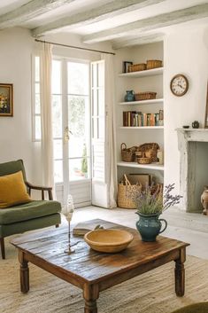 a living room filled with furniture and a fire place