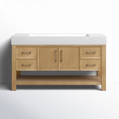 a bathroom vanity with two drawers and a white counter top in front of a wall