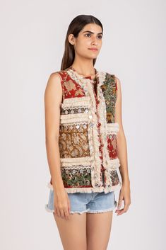 DESCRIPTION: Experience the fresh floral vibes with our boho floral hand block printed vest. This statement piece combines bohemian style with eco-consciousness, crafted from organic cotton. With its mesmerizing multi floral hand block print, delicate lace trim, and intricate antique coin embroidery, this vest is sure to elevate your outerwear collection DETAILS: Hand Block Printed. Handmade. Front fabric buttons with loops. Contrast piping. Sleeveless. Vegetable Dyes. Lace trim. Coins Embroider Boho Vest, Floral Vests, Fabric Buttons, Antique Coins, Cotton Vest, Contrast Piping, Hand Block Print, Modern Prints, Boho Floral