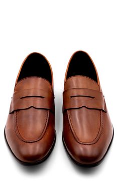 This handsome penny loafer features classic detailing for a timeless look and is supported by a sturdy rubber sole. Leather upper and lining/rubber sole Made in Portugal Penny Loafer, Suede Loafers, Nordstrom Store, Penny Loafers, Loafers Men, Tan Leather, Penny, Rubber Sole, Dress Shoes Men