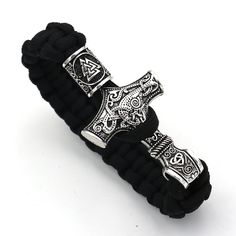 PRICES MAY VARY. VIKING HAMMER RUNE KNOT BRACELE- Viking hammer symbolizes power and strength. With hammer pattern, Nordic Viking Valknut hammer knot bracelet can incredibly boost your confidence and greatly show your personality holding its own in any situation. PREMIUM MATERIALS- 9.1 inch long, Hip Hop hammer rune knot bracelet is durable and sophisticated. Celtic hammer bracelet is also a clear demonstration of superb craftsmanship, offering resistance to wear. Viking hammer braided bracelet