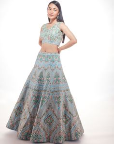 A modern and chic skirt with applique and resham work paired with embroidered blouse and net dupattaFrom Chamee and Palak 's The Wedding Edit collection DELIVERY TIMEPlease allow 8-12 weeks for your outfit to arrive. FABRIC DETAILSSilk And Net Professional cleaning only. Semi-stitched Multicolor Embroidered Dress For Reception, Multicolor Embroidered Semi-stitched Dress For Reception, Elegant Multicolor Embroidery Sets For Reception, Silk Sets With Multicolor Embroidery For Wedding, Fitted Dresses With Multicolor Embroidery For Reception, Fitted Lehenga With Multicolor And Resham Embroidery, Fitted Lehenga With Resham And Multicolor Embroidery, Blue Silk Embellished Lehenga, Fitted Multicolor Embroidery Set For Reception