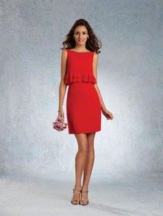 a woman in a red dress is posing for the camera with her hand on her hip