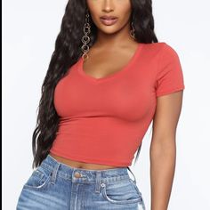 Fashion Nova V Neck Crop Tee - Rust Short Sleeve Tee V Neck Cropped Stretch 95% Cotton 5% Spandex The Color Is A True Rust Color. Its A Little More Orange Than The Picture Shows. Basic Fitted V-neck Top, Red Seamless V-neck Top, Casual Seamless Short Sleeve Top, Trendy Seamless V-neck Top, White Ribbed Top, Black Crop Tee, Short Sleeve Tunic Tops, Black Graphic Tees, Fashion Nova Tops