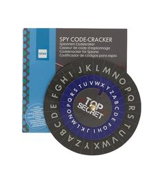 the top secret spy code cracker is shown in front of a card with an image of