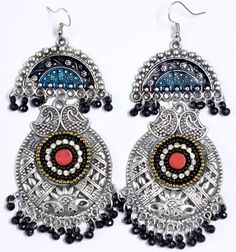 Intricately handmade by talented artisans in India, these tribal earrings are hand engraved and then set with beads and crystals and also lacquered in teal and black. Small black beads enhance the overall look. Since they have a long dangle they will enhance your neck. Traditional Round Bead Earrings For Festivals, Traditional Turquoise Dangle Chandelier Earrings, Bohemian Chandbali Beaded Earrings For Festive Occasions, Traditional Beaded Chandbali Danglers, Traditional Beaded Chandelier Earrings For Festive Occasions, Traditional Earrings With Oxidized Finish And Adjustable, Bohemian Beaded Chandbali Jewelry, Traditional Earrings With Oxidized Finish, Bohemian Chandbali Beaded Jewelry